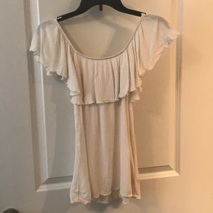 Super cute flouncy and fun over the shoulder top